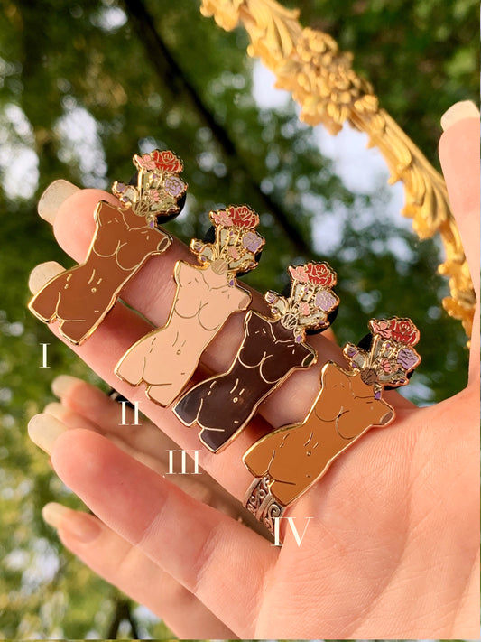 “growth.” enamel pin